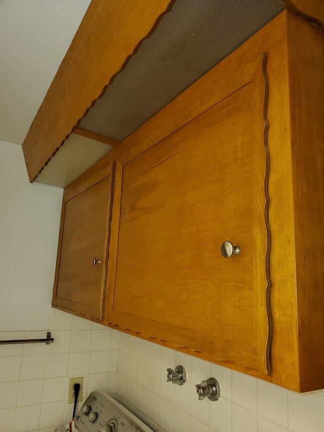 Bathroom 2 (with laundry) - cabinets over laundry units - 7013 Seaview Terrace SW