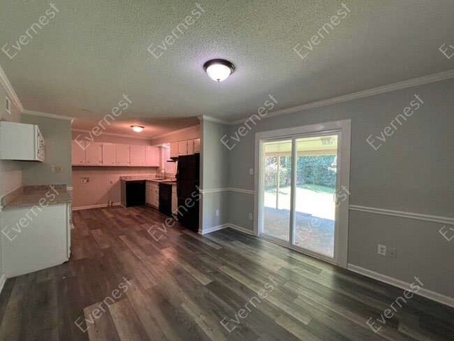Building Photo - 7077 Carrolton Dr W