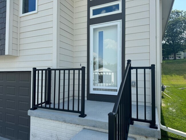 Building Photo - Luxury Bennington Townhome Ready For Move In