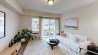 This 730 square foot apartment in Post Falls, Idaho offers a thoughtful layout with 2 bedrooms and 2 bathrooms. The single-story design maximizes efficiency, with the primary bedroom spanning 140 square feet. The heart of the home is an open-concept living area, showcasing a comfortable living room with sliding glass doors that lead to an outdoor patio, flooding the space with natural light. The kitchen boasts wood cabinetry, modern appliances, and a breakfast bar, perfect for casual dining. Both bathrooms feature clean lines and ample counter space, while the in-unit laundry adds convenience. Neutral tones and wood-look flooring create a cohesive aesthetic throughout. The second bedroom provides versatile space for guests or a home office. With its blend of functionality and style, this apartment offers a turnkey living solution in a desirable location.
