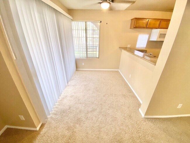 Building Photo - CUTE GATED COMMUNITY CONDO! NEW PAINT & NE...