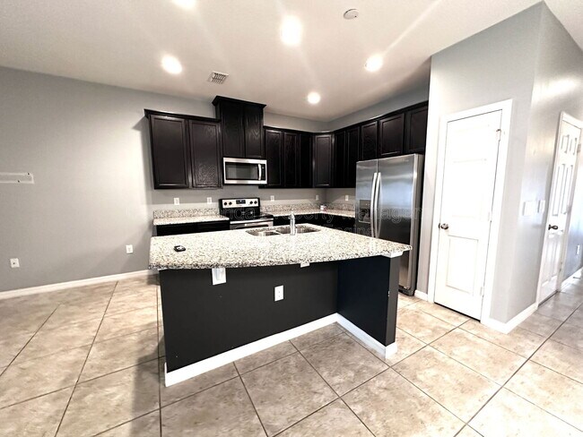 Foto del edificio - 1453 River Rock Ct