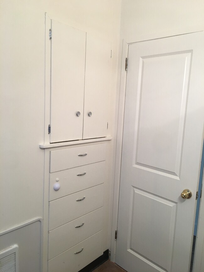 Built in cabinets and drawers in bathroom! - 115 N Main St