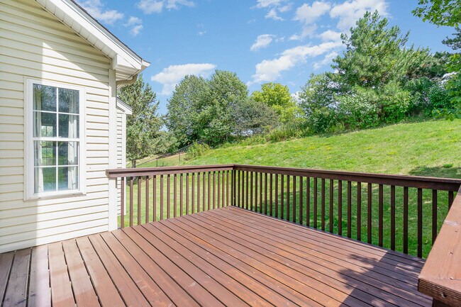 Enjoy the peace of the backyard. Even a few raspberry bushes~ - 4922 Rusten Rd