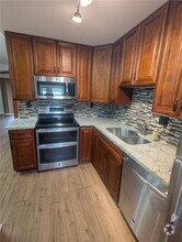 Building Photo - 703 Gardens Dr