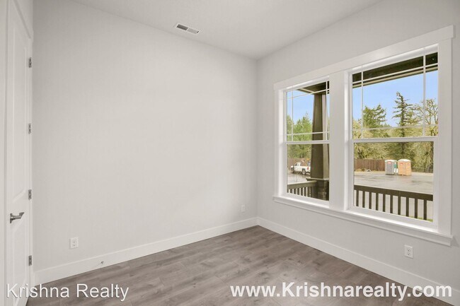 Foto del edificio - 5 br, 3 bath House - 7851 NW Kate Pl