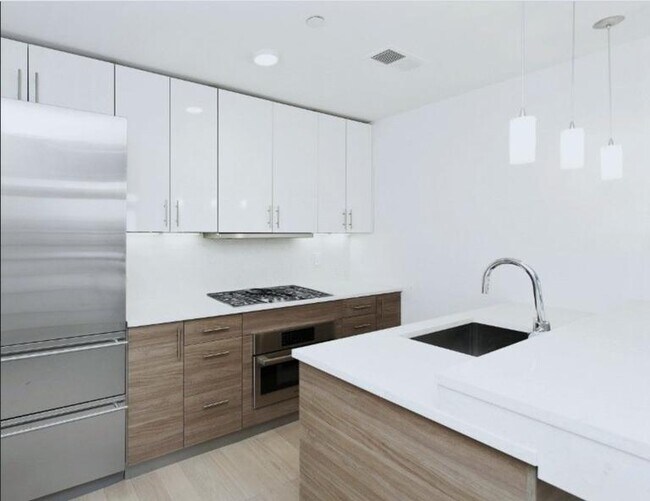 Building Photo - Penthouse with Private Patio--The New Down...
