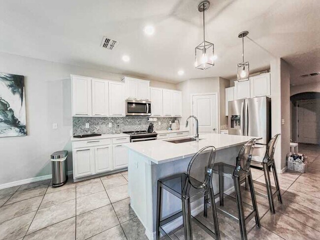 Building Photo - 7409 French Marigold Ave.