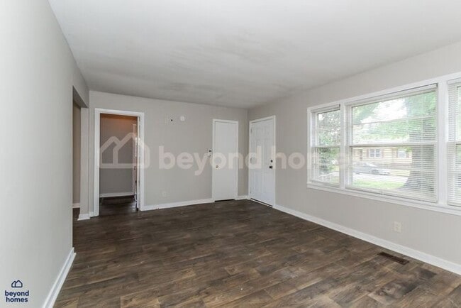 Building Photo - Updated Bungalow with Massive Deck and Fully Fenced Yard!