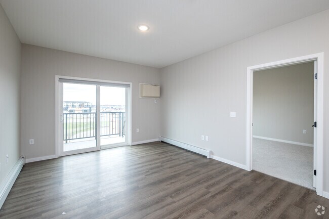 2BR, 2BA - 1,015SF - Living Room - Compass