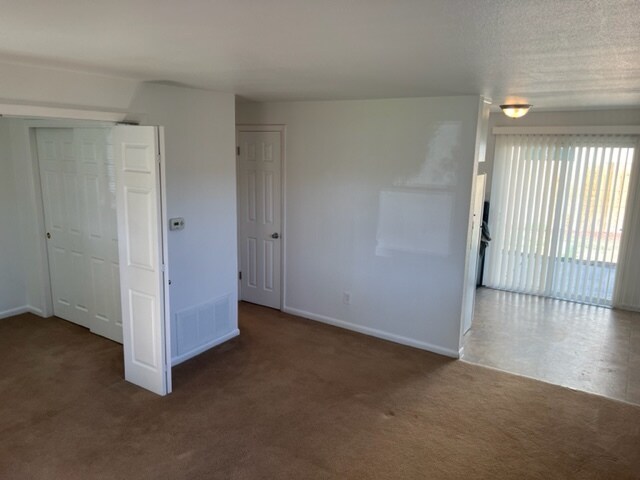 Living room picture of hall and glass sliding back yard door - 81 W Southern St