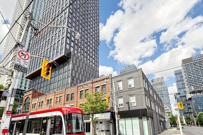 Building Photo - 100 Queen St E