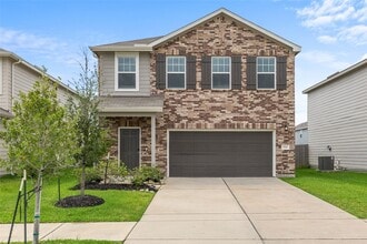 Building Photo - 7810 Pink Dahlia Dr