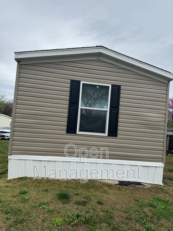 Building Photo - 2710 N Farm Rd 137