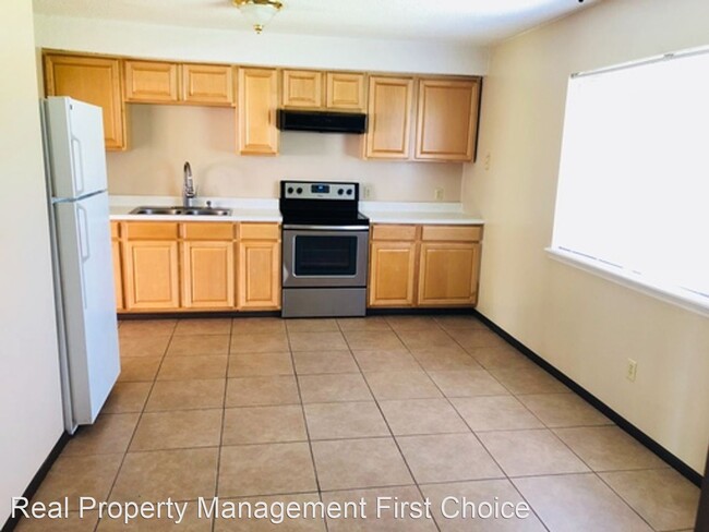 Building Photo - 3 br, 1.5 bath House - 402 42nd Circle West