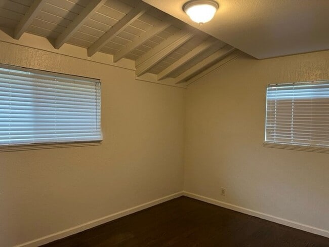 Building Photo - Central heat and air. Real hardwood floors.