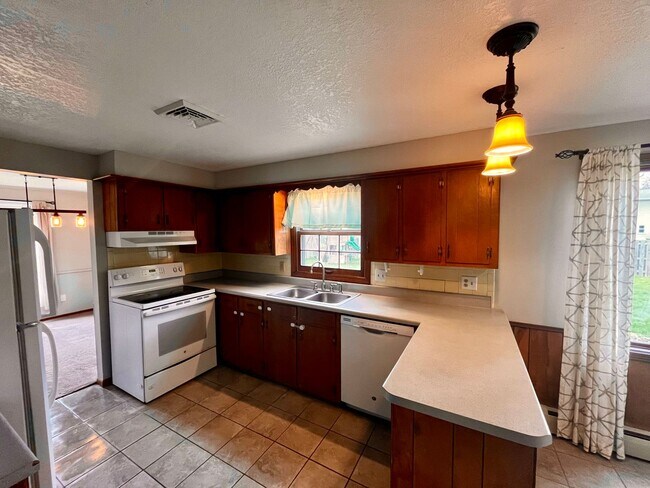 Building Photo - Home For Rent By Capital Property Management