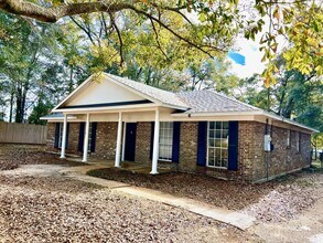 Building Photo - 7981 Musketeer Dr