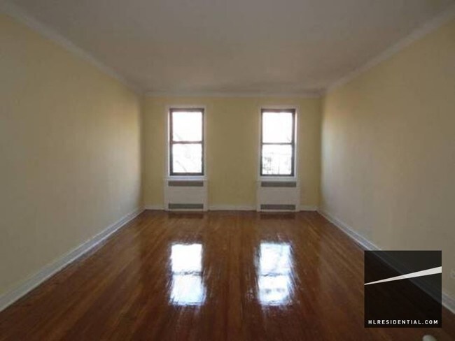 Building Photo - 8449 Elmhurst Ave