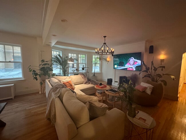 Pottery Barn Furnishings 75" tv and premium surround sound. - 609 W Stratford Pl