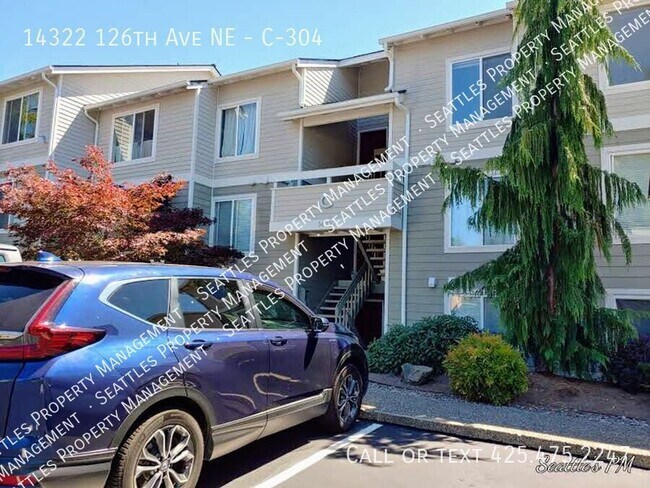 Building Photo - Top Floor 2 Bedroom Condo- with Vaulted Ce...