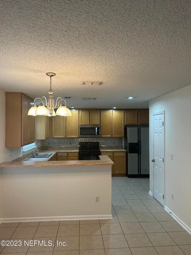 Foto del edificio - 1603 Canopy Oaks Dr