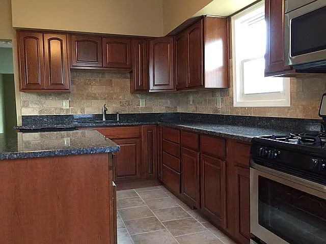 updated granite - 526 W 2nd Ave