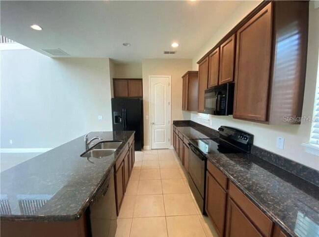 Foto del edificio - 8706 Tavistock Lakes Blvd