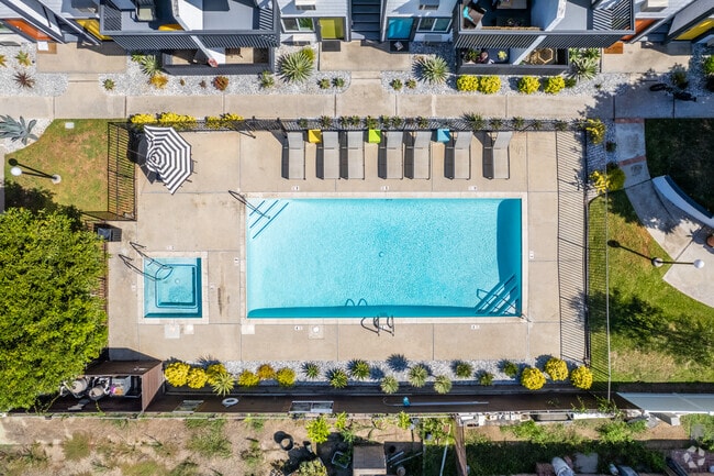Relax by our sparkling pools and spas. - Eastside Apartments