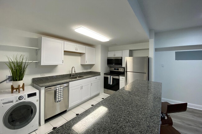 Cocina con lavadora - Lincoln Tower Apartments