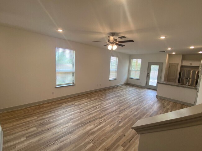 Building Photo - Spacious Three-Bedroom Duplex in Gated Community @ Cinco Lakes