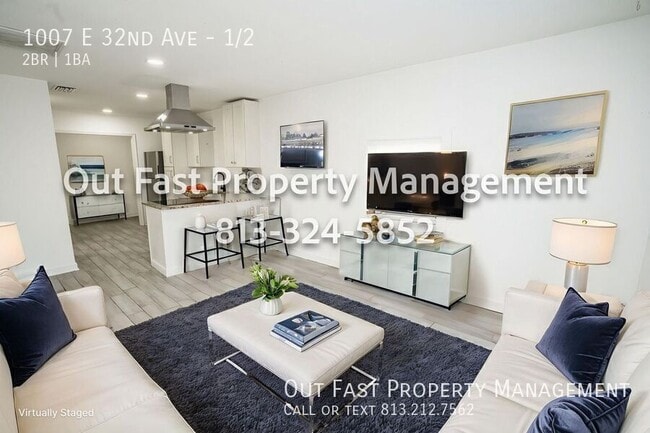 Building Photo - 1007 E 32nd Ave