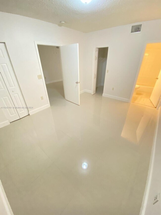 Building Photo - 3271 Sabal Palm Manor
