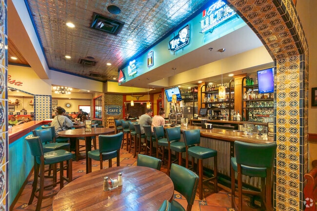 Wedgewood residents enjoy a drink at the bar of Mexican Inn Cafe.