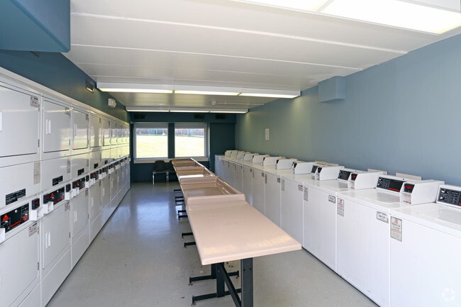 Laundry Room - Whispering Oaks Apartments