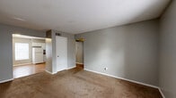 Located at 3471 W Briarpark Dr in Memphis, TN, this single-story, 3-bedroom, 2-bathroom home offers a practical and functional layout. The interior is finished with neutral gray walls and white trim throughout, creating a clean, cohesive look. Carpeted flooring runs through the living areas and all three bedrooms, while the kitchen and bathrooms feature hard surface flooring.

The open kitchen and dining area is a highlight of the home, showcasing an L-shaped layout with white cabinetry, dark countertops, and white appliances including a refrigerator and electric range. A window above the counter brings in natural light, and a pantry provides additional storage.

The living room is generously sized with access to the rest of the home via a central hallway. Each bedroom offers comfortable proportions, with the primary bedroom providing a well-sized retreat. The bedrooms include closets — with four closets total across the home — offering ample storage. Bedroom windows allow natural light to filter in.

The two bathrooms each include a full tub and shower combo with white tile surrounds and wood-tone flooring. A utility room rounds out the layout, adding practical functionality. The home connects efficiently through a central hallway, making for a logical and easy-to-navigate floor plan.