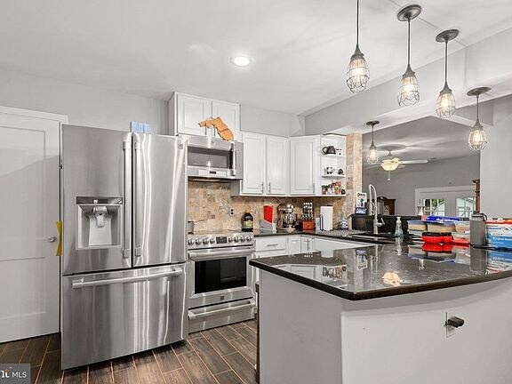 Foto del edificio - 8313 Rolling Rd