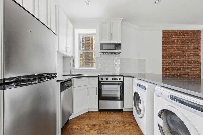 Foto del edificio - 411 E 118th St