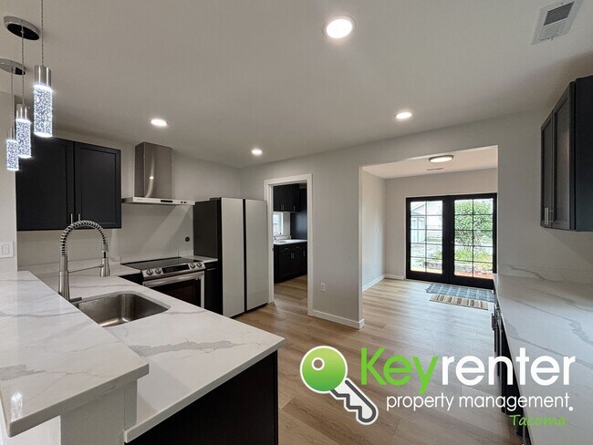 Building Photo - Freshly Remodeled Tacoma Gem with Smart Fe...