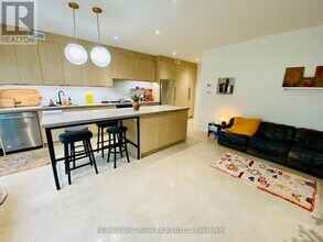 Building Photo - 1540 King St W