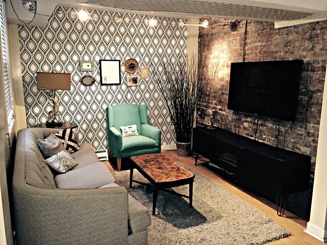 Living Room With Exposed Brick - 551 W Roscoe St
