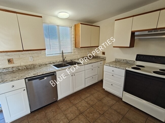 Building Photo - 3755 S Amos Pl