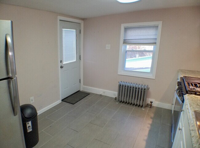 View of kitchen from living room entry. - 7 S Hillside Ave