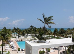 Building Photo - 10275 Collins Ave