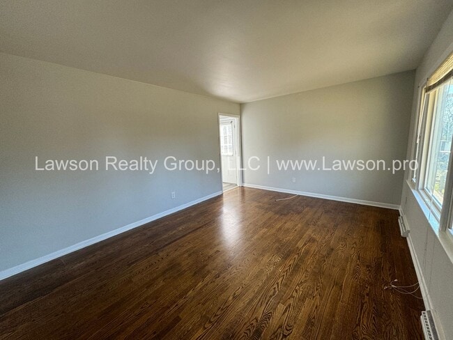Building Photo - Solid Brick Ranch with Fenced in Yard