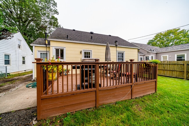 Large back-deck with steps to driveway and rear entrance to kitchen - 425 Virginia Ave