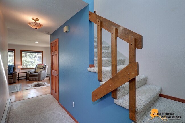 Building Photo - Cozy Eagle River Home with Backyard Trails!