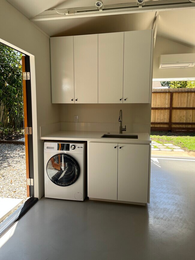Washer/Dryer combo unit and custom cabinetry - 2401 32nd St