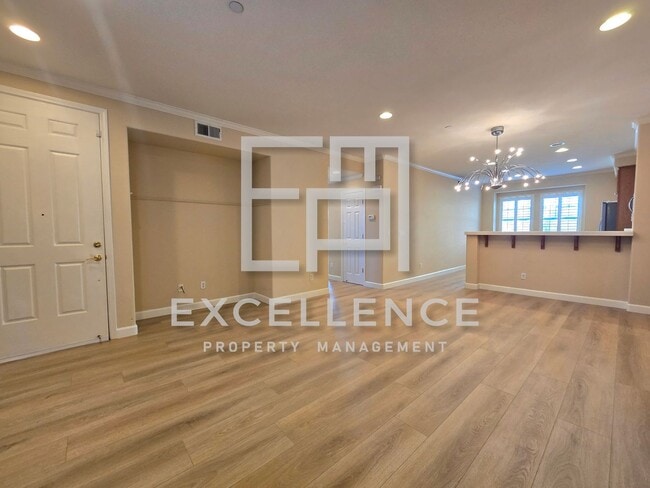 Building Photo - Fabulous 2/2 Condo with 2 Car Tandem Garage, New Floors Throughout, Views From Bedrooms, W/D, Pet...