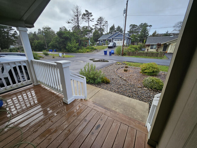 Front porch to sit and enjoy all our rainy days. - 3626 Sea Mist Ave